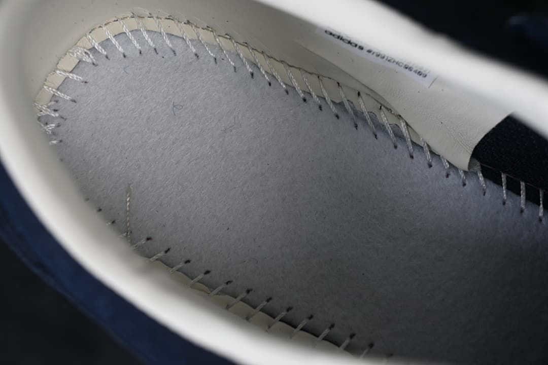 Close-up of interior stitching and lining.