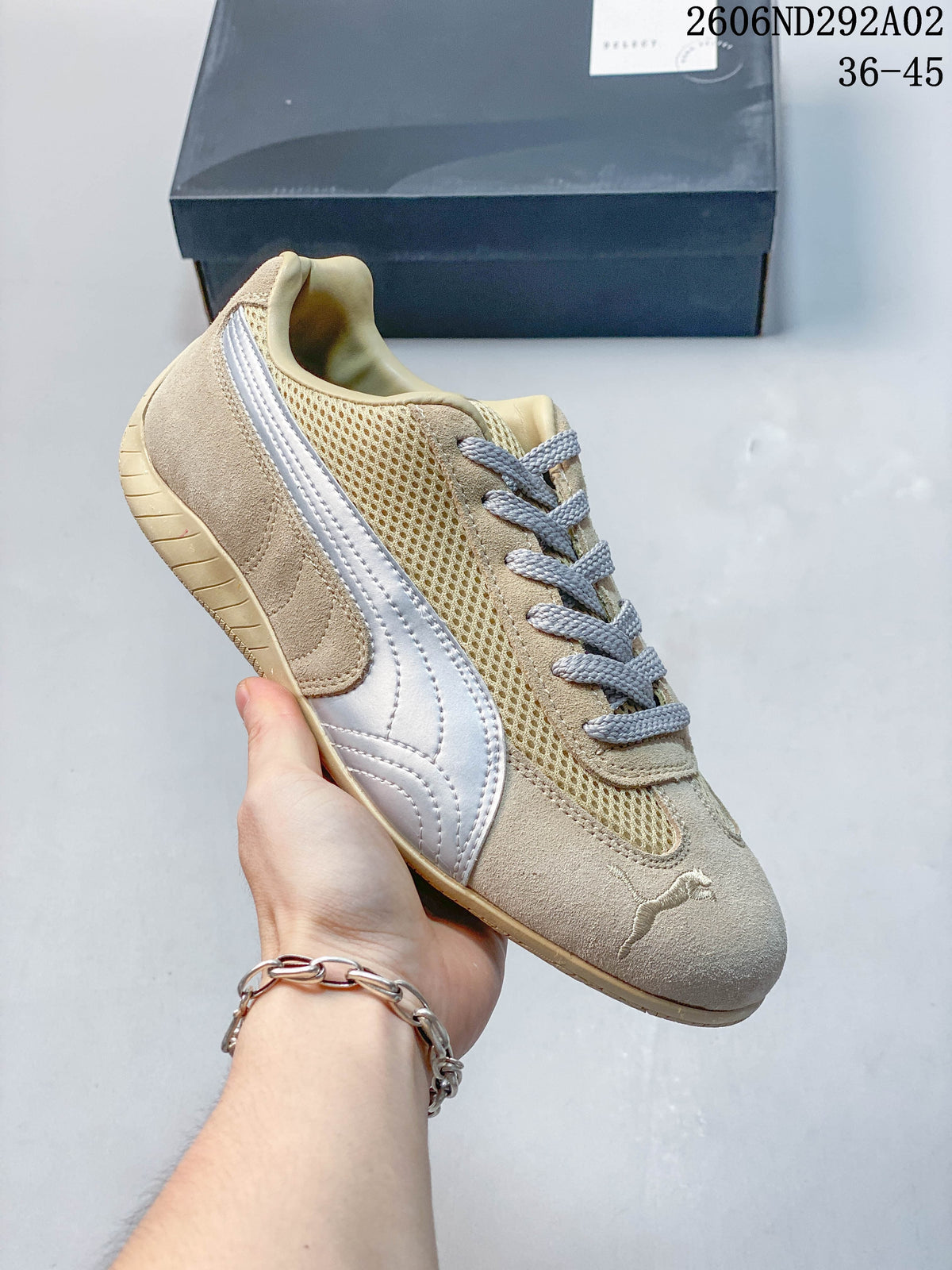 Beige Puma Speedcat The Open YY sneaker with a light mesh-look panel and pale side stripe