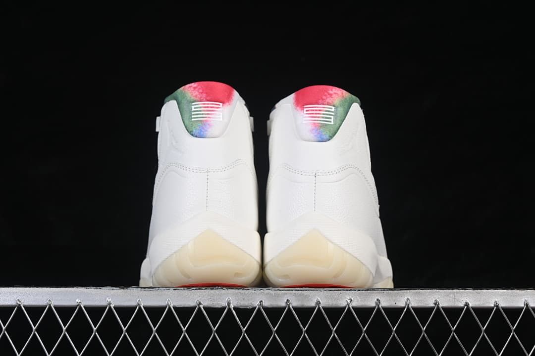 Rear view of both sneakers with multicolor heel accents.