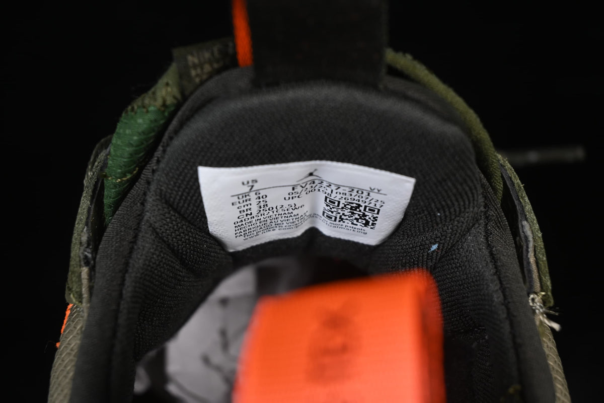Inside shoe label with style code FV4227-201 and sample size information.