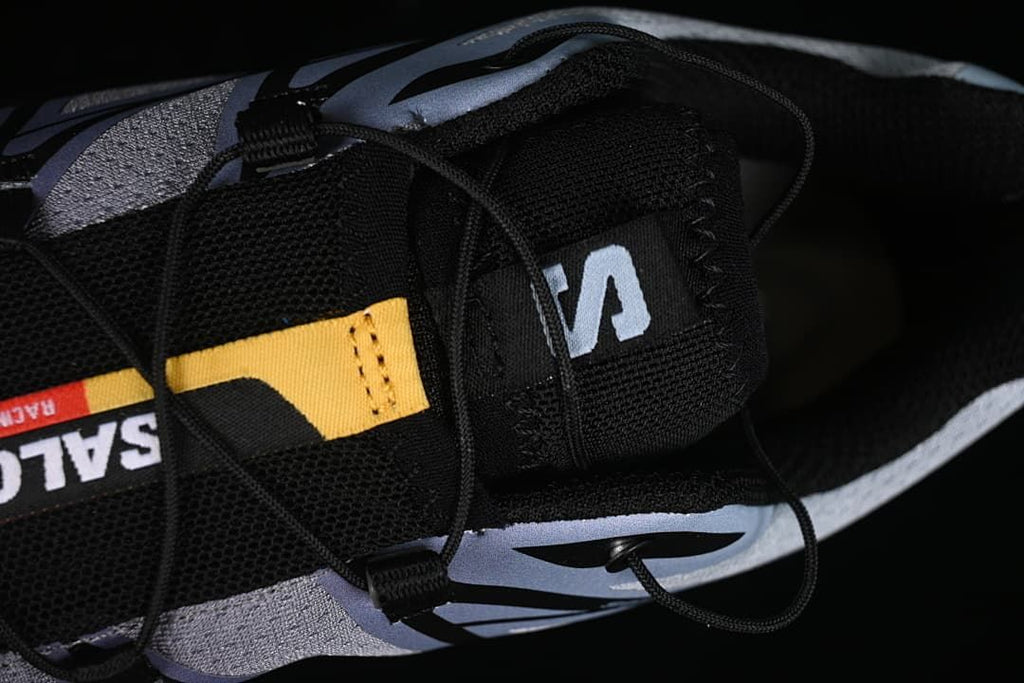 Top-down close-up of the black tongue and cord-style lacing system.