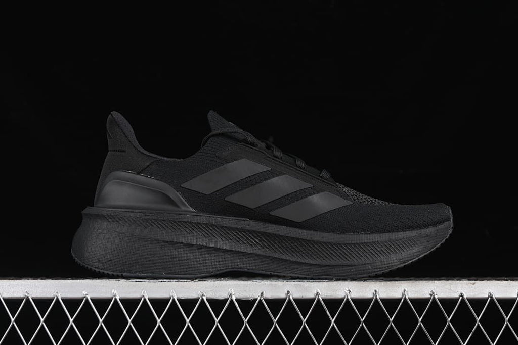 Side profile of the black shoe