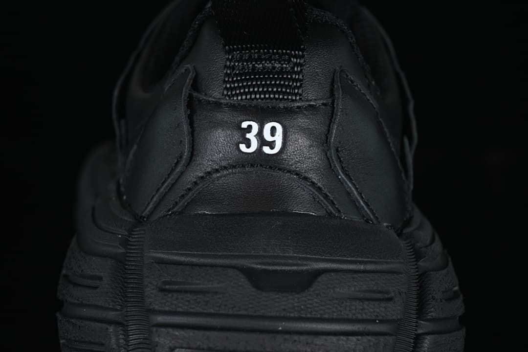 Rear view of the shoe showing a size 39 marking and heel pull loop