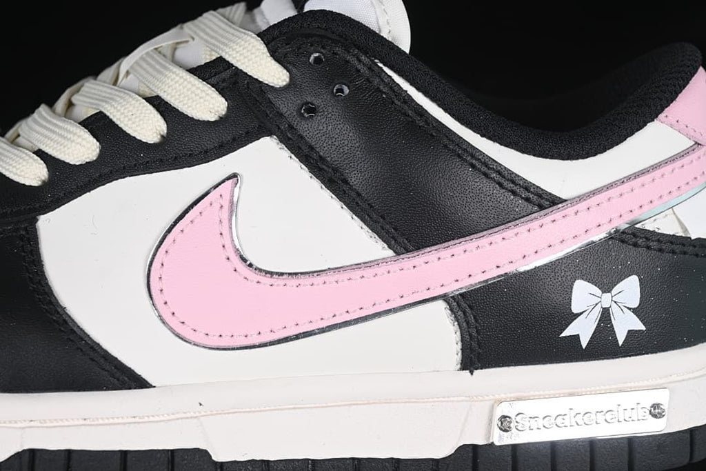 Side detail of the pink Swoosh and bow accent