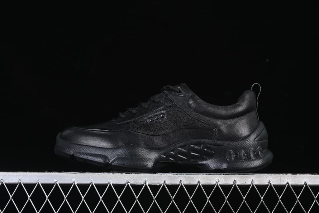 Black ECCO BIOM sneaker shown in side profile