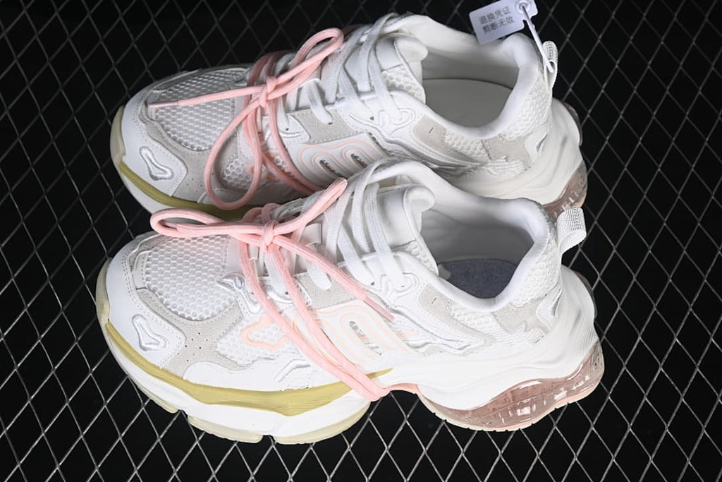 Pair of GG-CC sneakers photographed from above at an angle.