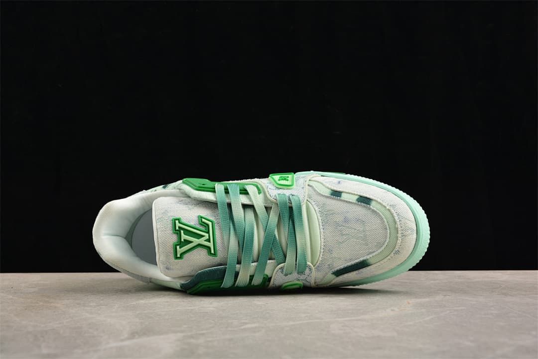 Top view of the sneaker showing its laces, tongue, and patterned upper.
