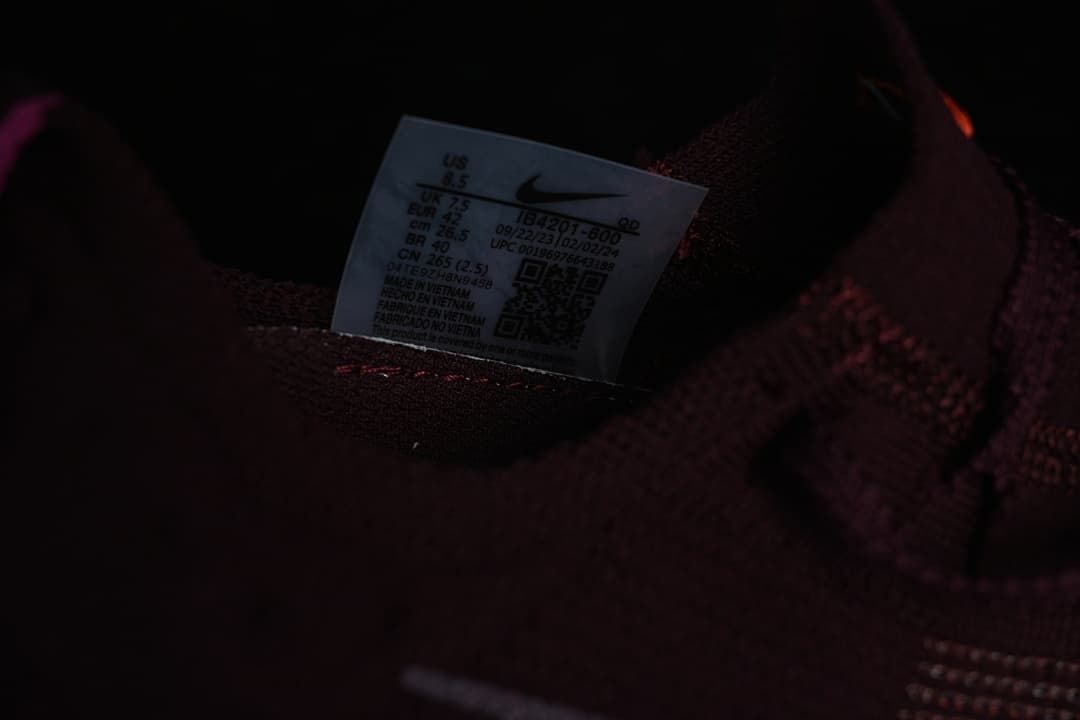 Interior size label photographed inside the burgundy shoe