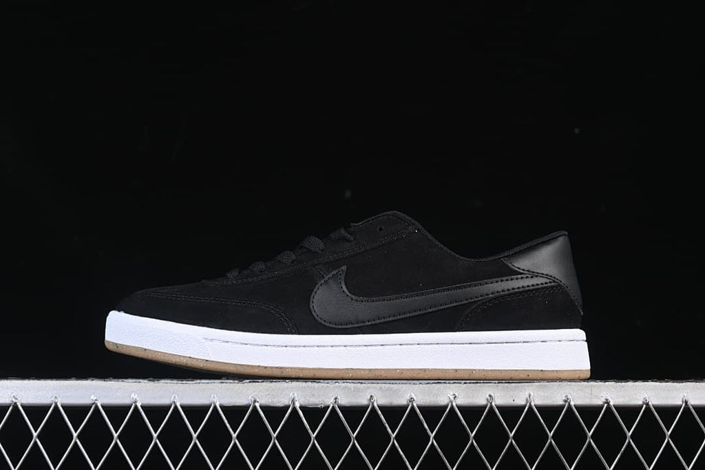Side view of a black Nike SB FC Classic shoe with a white midsole and gum-colored outsole.