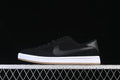 Side view of a black Nike SB FC Classic shoe with a white midsole and gum-colored outsole.