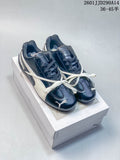 Three PUMA Speedcat TTF sneakers shown from above in navy and pink, navy and cream, and cream with navy accents.