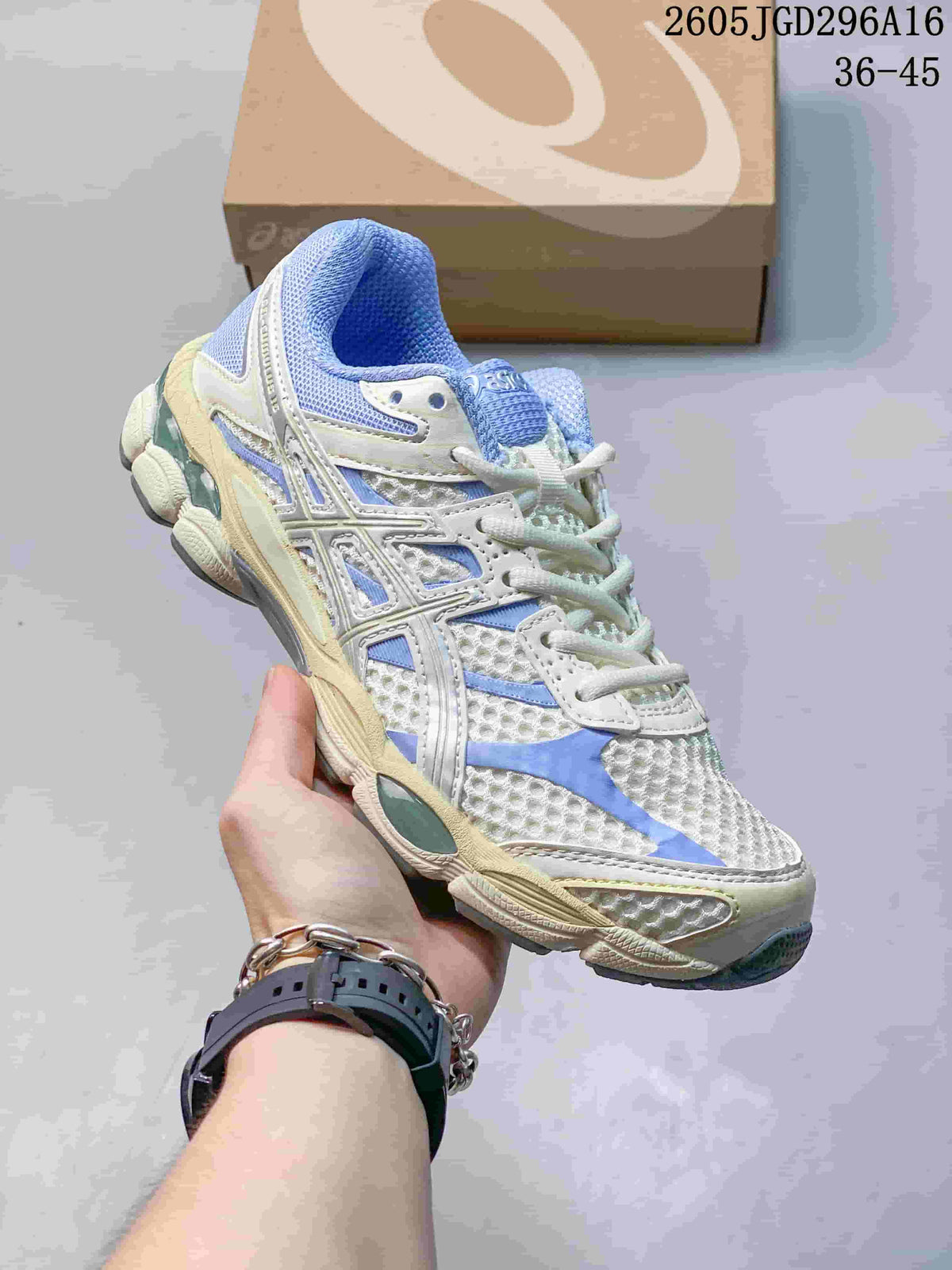 White ASICS Gel-Cumulus 16 sneaker with light blue accents.