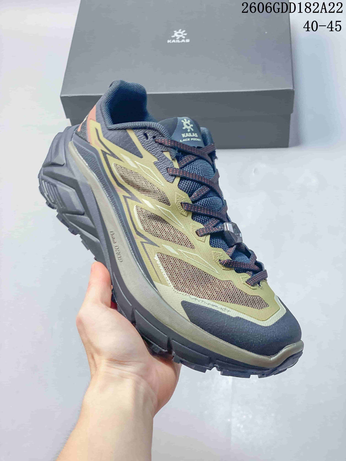 Angled side view of the KAILAS C4 trail shoe with rugged outsole