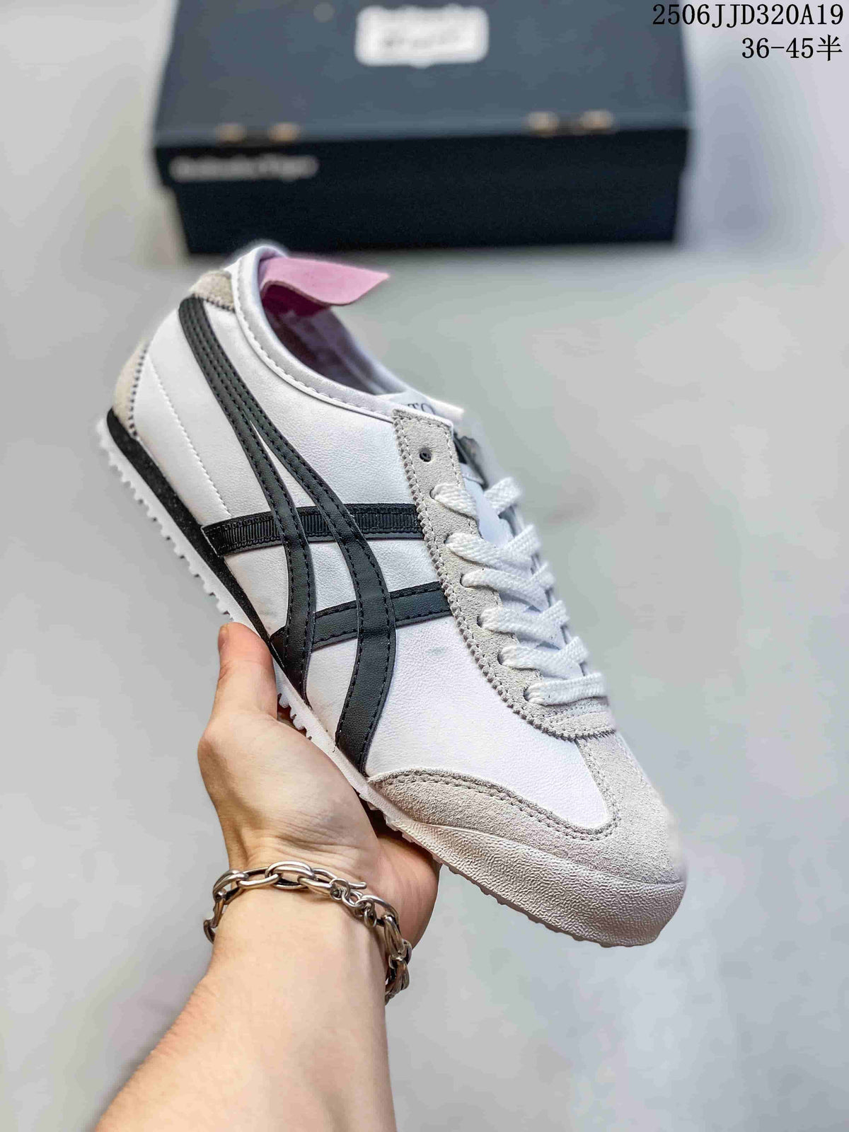 White low-top sneaker with black side stripes and light gray trim