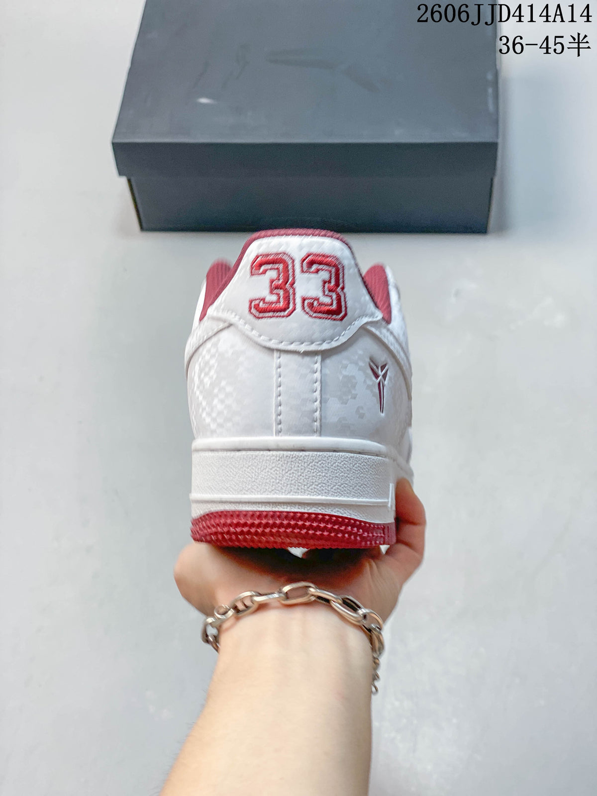 Rear view showing the number 33 graphic and burgundy-red heel outsole