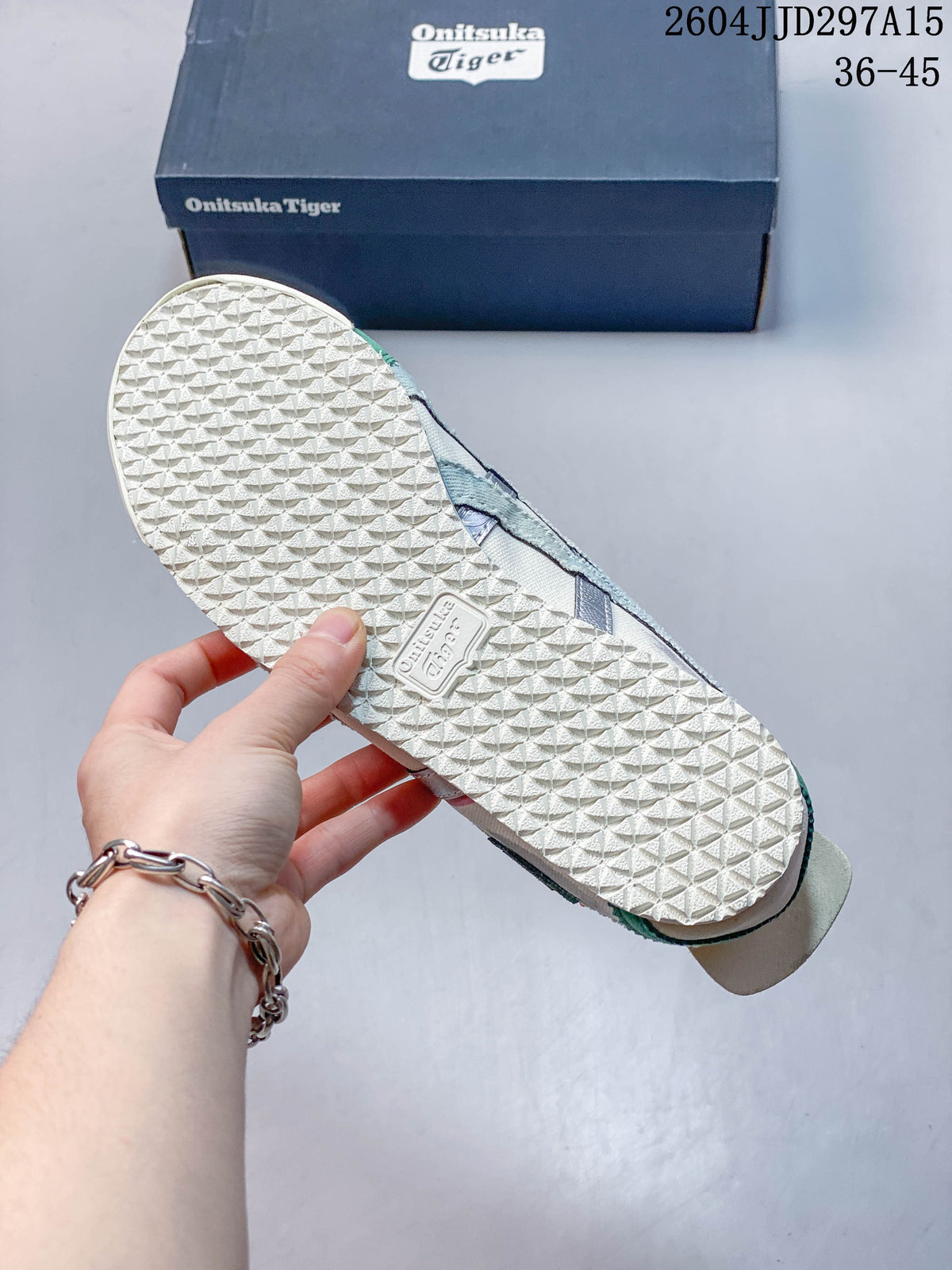 Close-up of the textured rubber outsole on an Onitsuka Tiger sneaker
