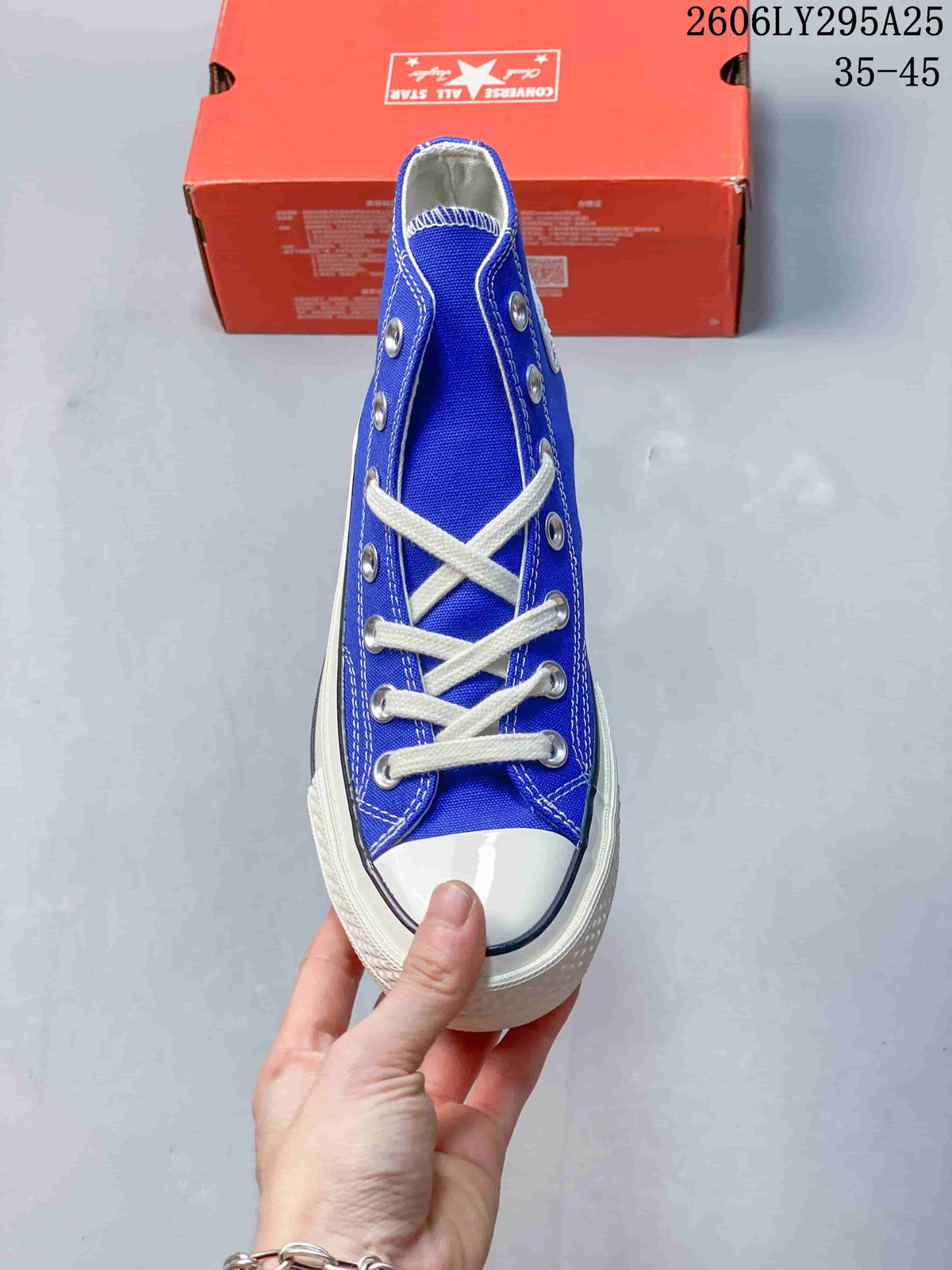 Front view highlighting the white laces and toe cap