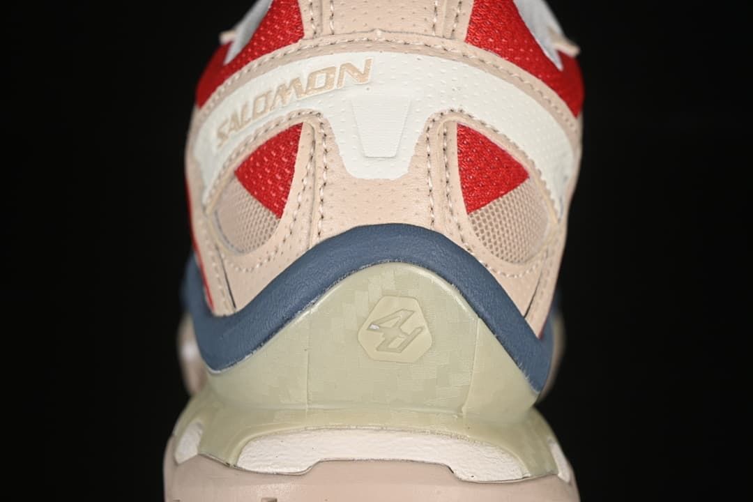 Rear view showing the shoe heel, branding, and layered colors