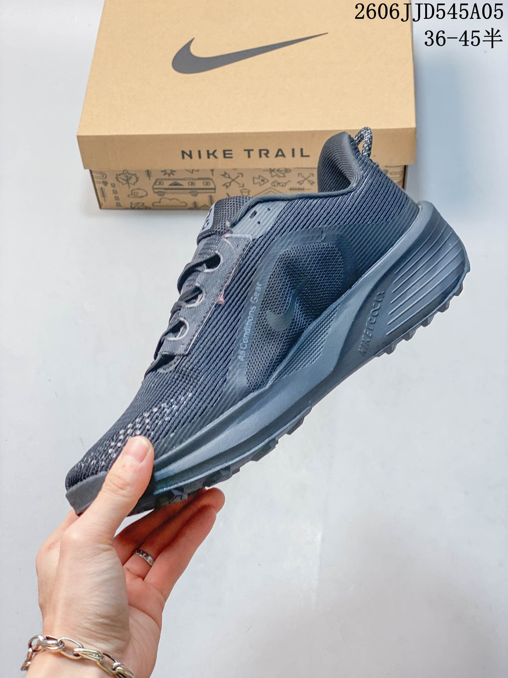 Side profile of a gray Nike Pegasus Trail 6 shoe