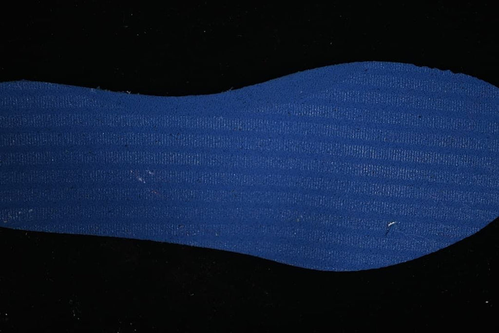 Close-up of a blue textured shoe insert.