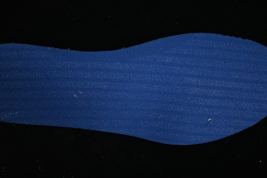 Close-up of a blue textured shoe insert.