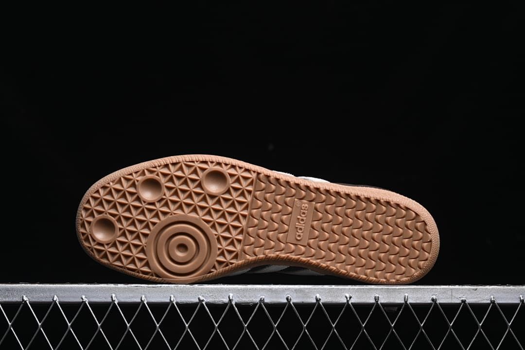 Underside view of the gum-colored outsole with textured tread