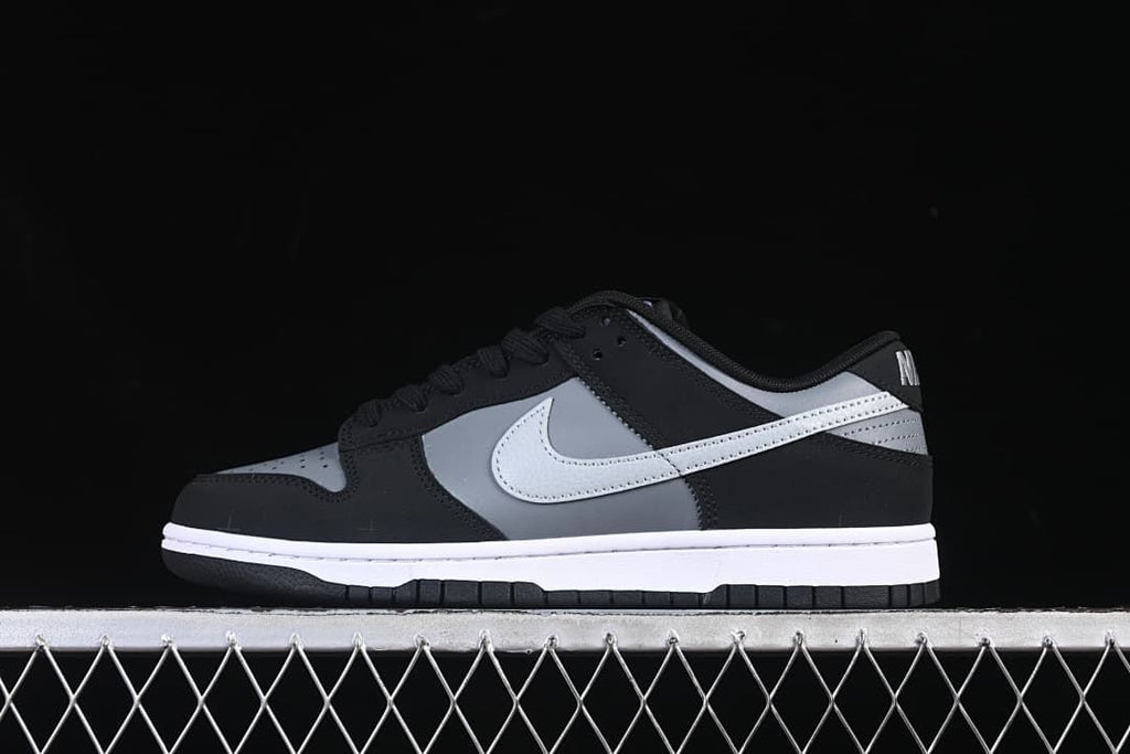 Side profile of the sneaker against a dark background