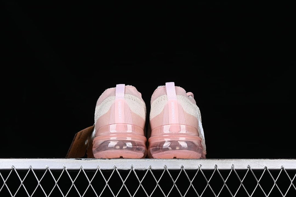 Rear view of the pair showing the heel details and transparent soles.