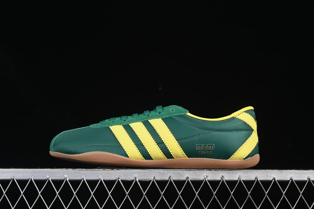 Side view of the adidas Tokyo W sneaker in green and yellow with a gum-colored outsole