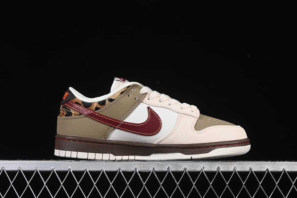 Side profile showing the sneaker's color-blocked panels and patterned heel