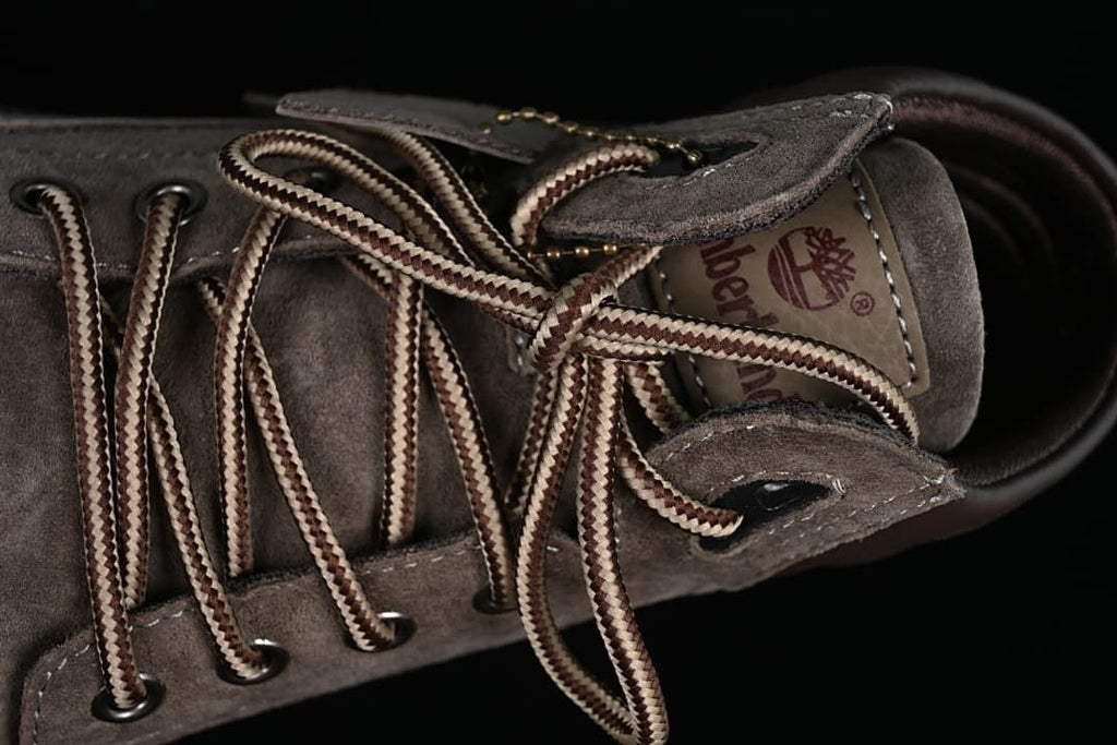 Close-up of the laces, metal eyelets, and tongue branding