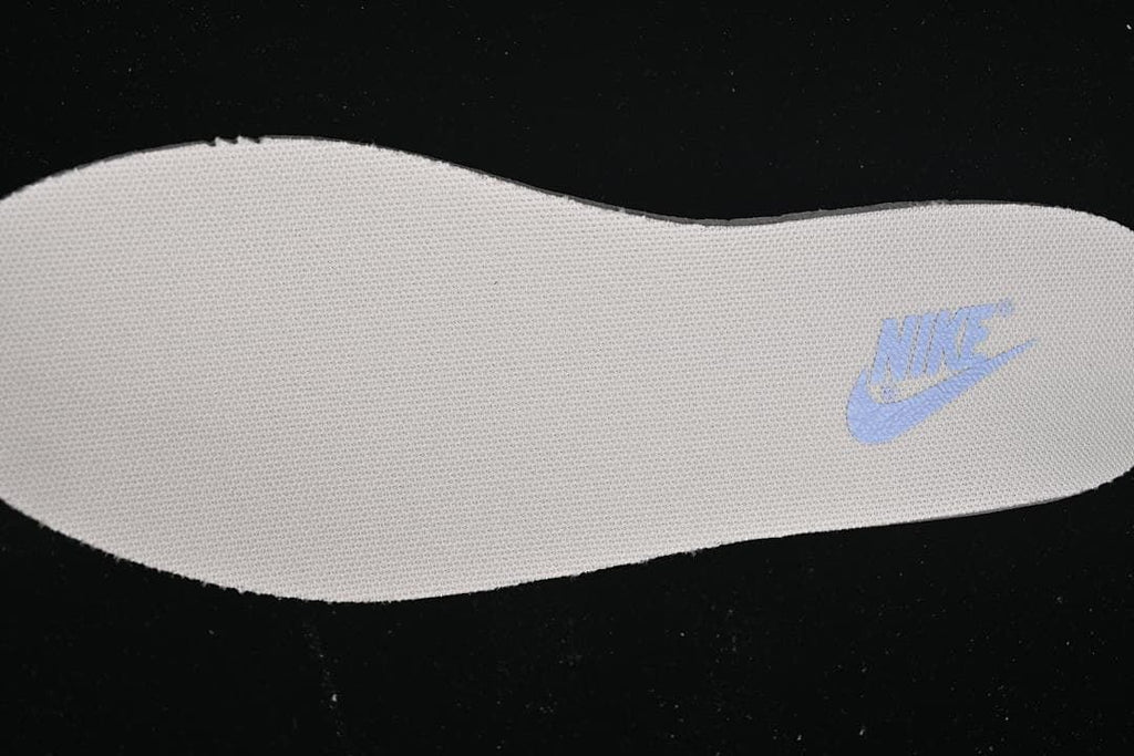 Close-up of the light blue Nike logo on the insole