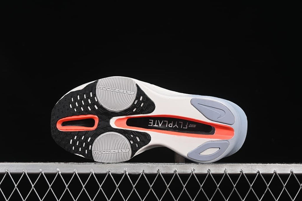 Bottom view showing the outsole tread and contrasting center section