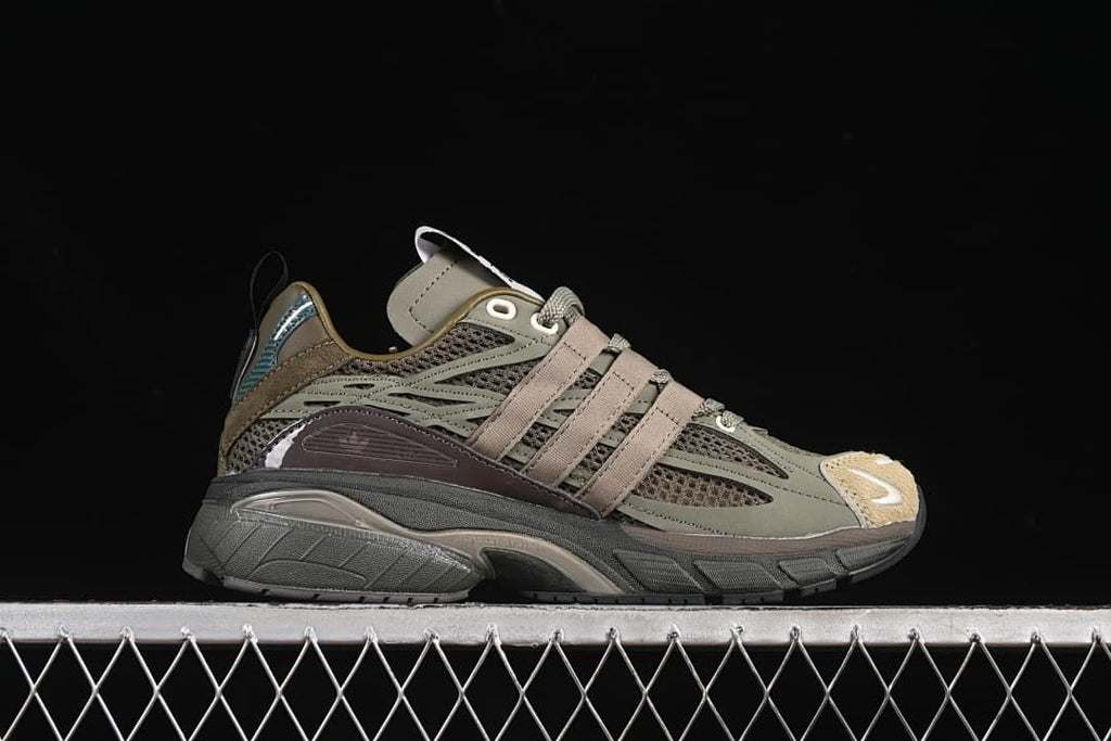 Side profile of the sneaker showing its layered upper and dark sole.