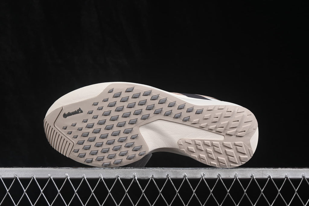 Close view of the patterned outsole with visible Continental branding and textured rubber sections.