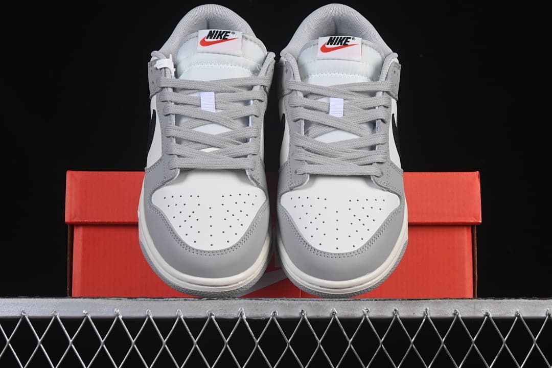Front view of the pair showing perforated toe boxes and grey laces