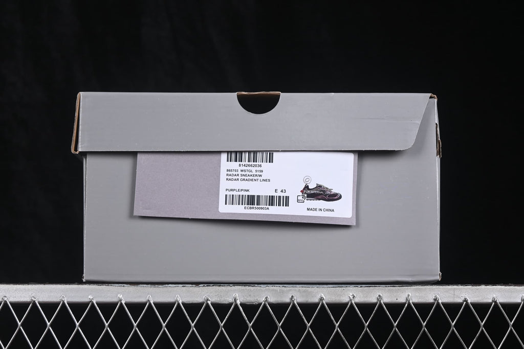 Gray shoe box with a product label showing Radar sneaker details, purple/pink color, and sample size EU 43.