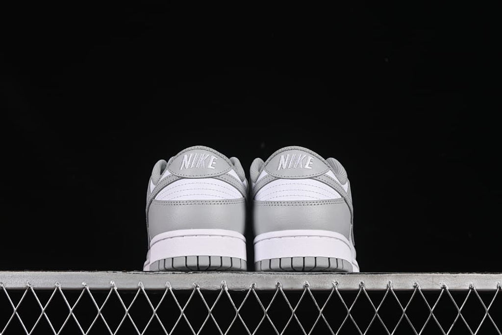 Rear view of the pair showing heel panels and branding