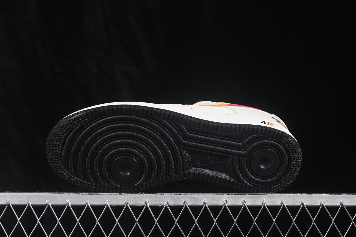 Underside view showing the black circular-pattern rubber outsole and Air branding.