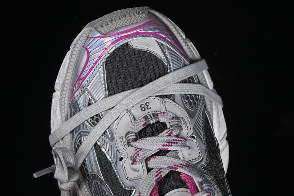 Top view of the sneaker showing the lacing, mesh and iridescent-look heel panel
