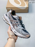 Silver and navy ASICS GEL-KAYANO 14 sneaker with metallic-look overlays