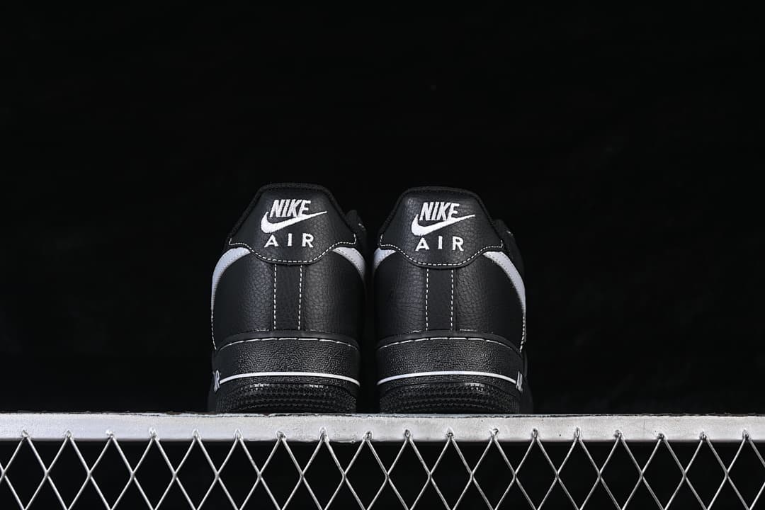 Rear view of the pair showing heel branding and white accents