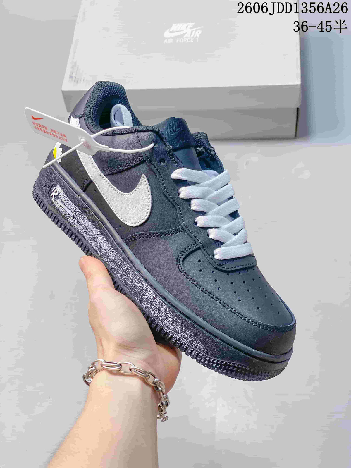 Dark blue-gray Nike Air Force 1 low-top sneaker with white Swoosh