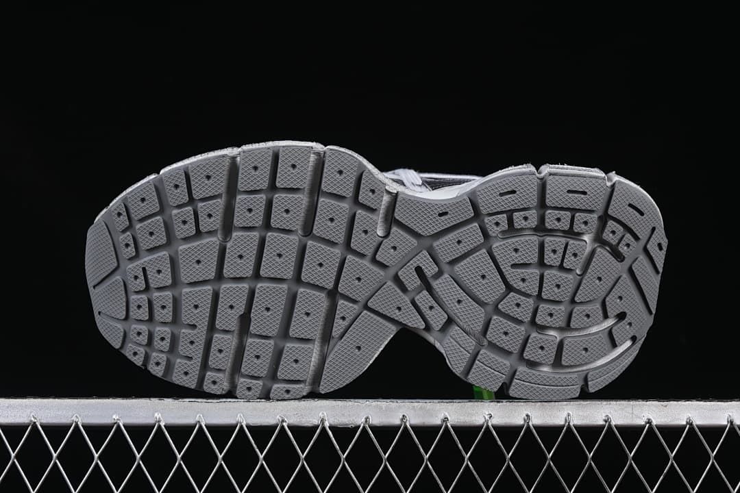 Underside view showing the segmented tread pattern