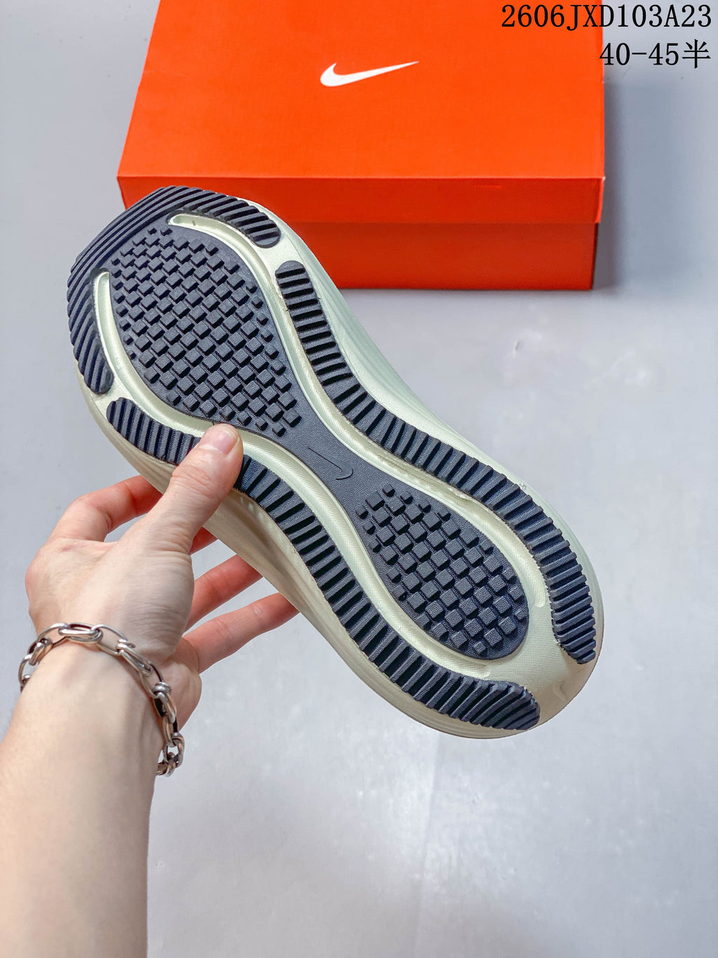 Close-up of the running shoe outsole showing its textured tread