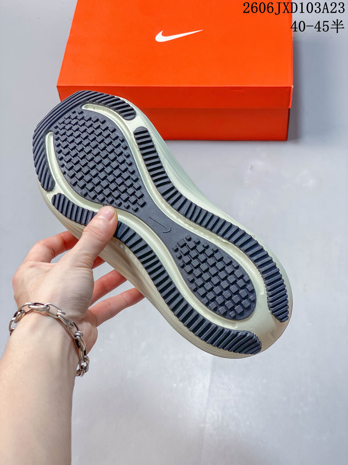Close-up of the running shoe outsole showing its textured tread