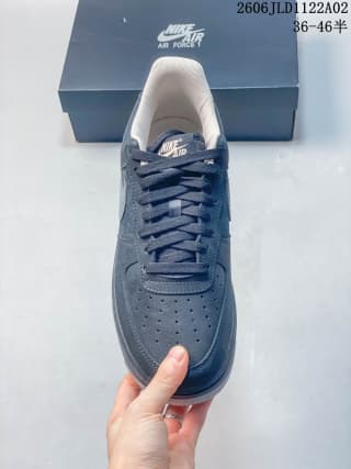 Top view showing the perforated toe box, laces and tongue branding of the sneaker.