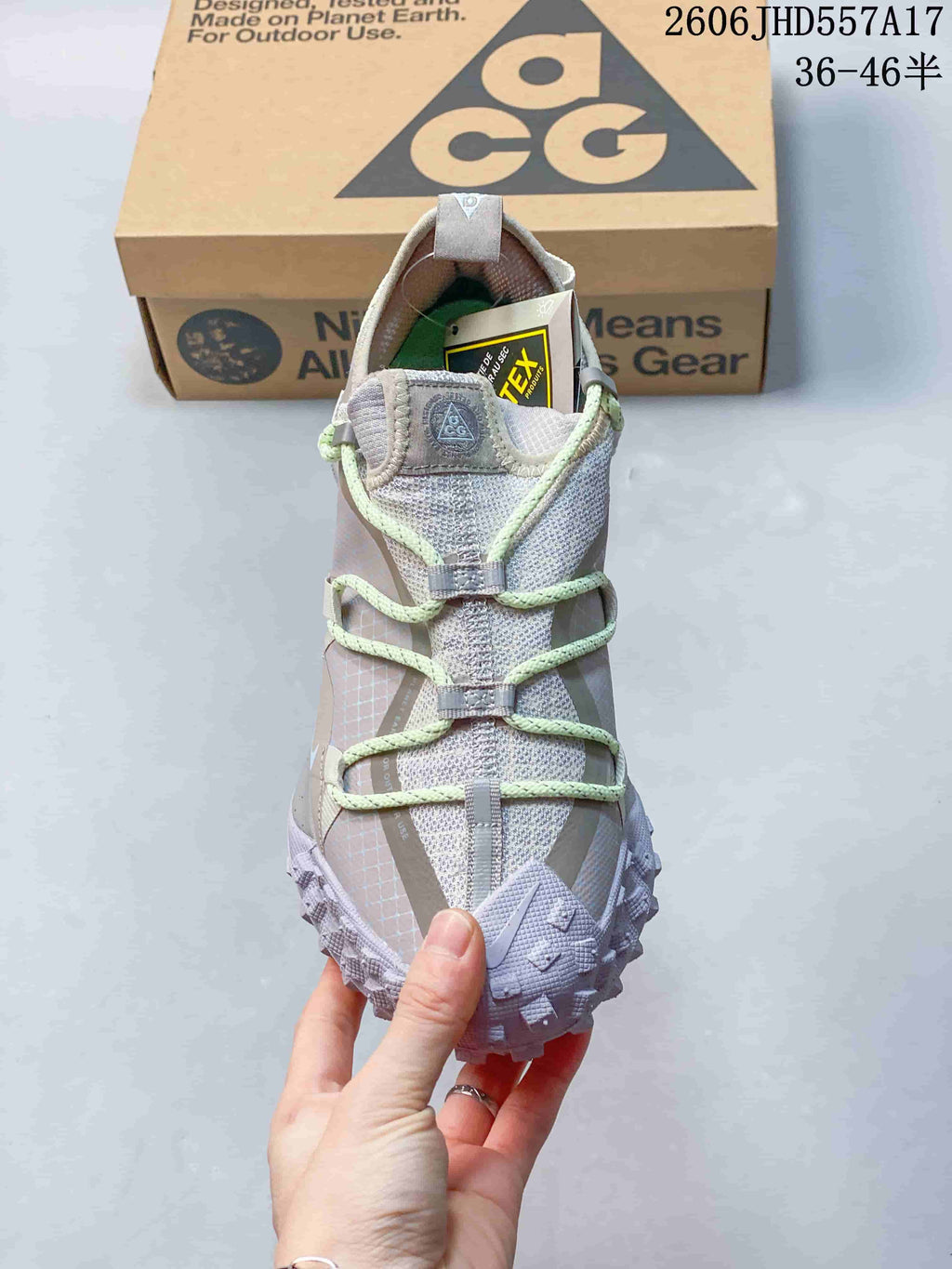 Front view of the sneaker showing the lace arrangement, upper, and reinforced toe.