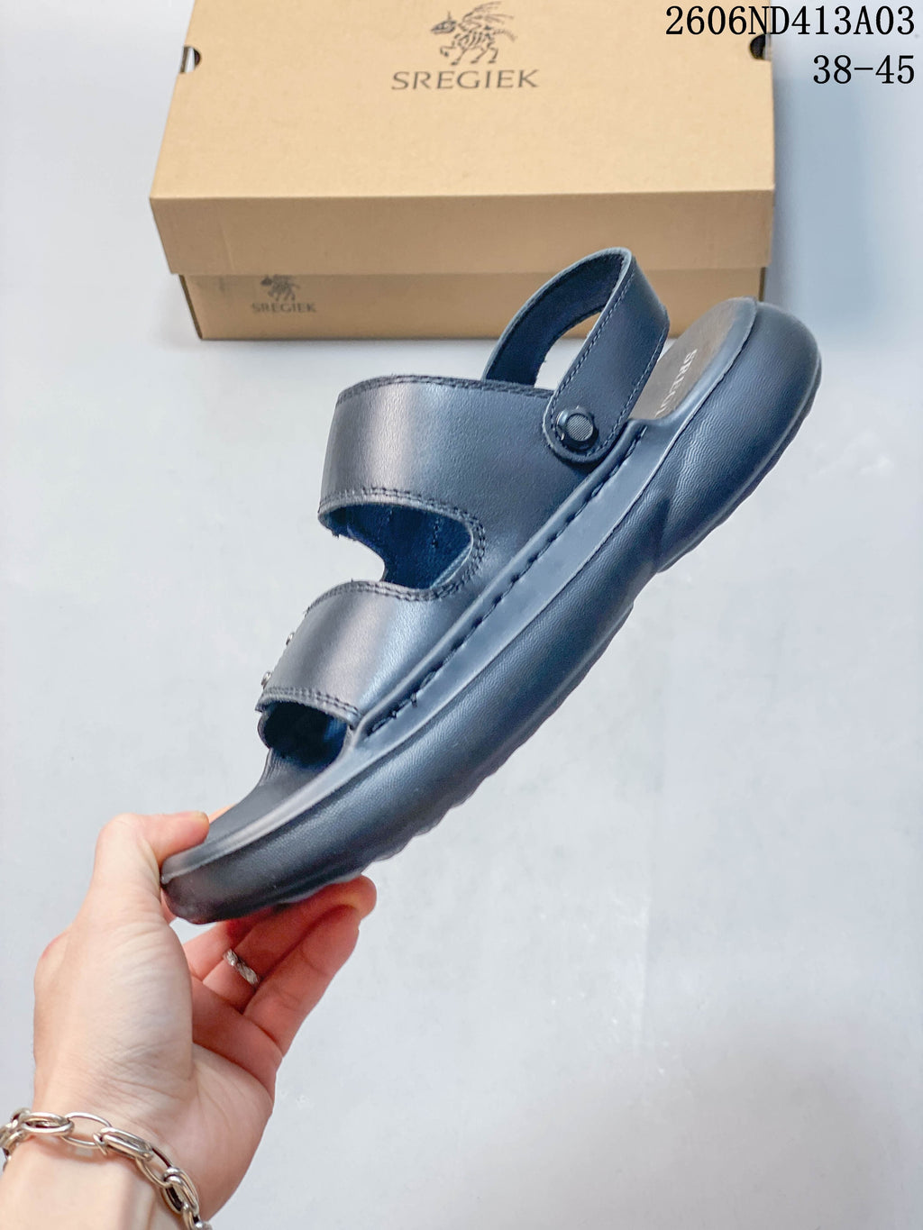 Side view showing the open-toe sandal profile and heel strap.