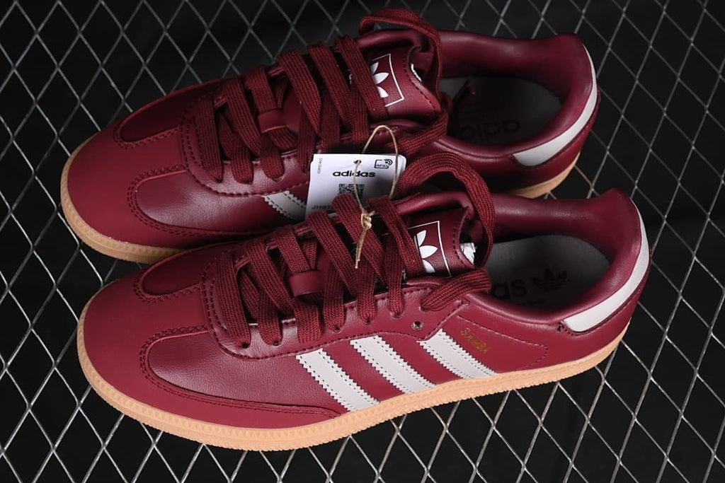 Pair of burgundy Adidas Samba OG W sneakers viewed from above
